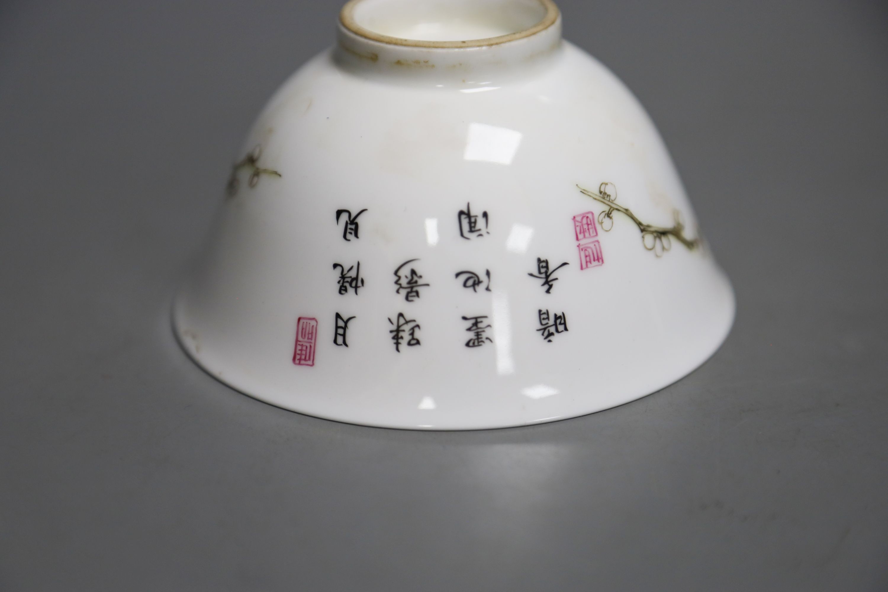 A Chinese blue and white figural bowl and another prunus decorated bowl, 11cm